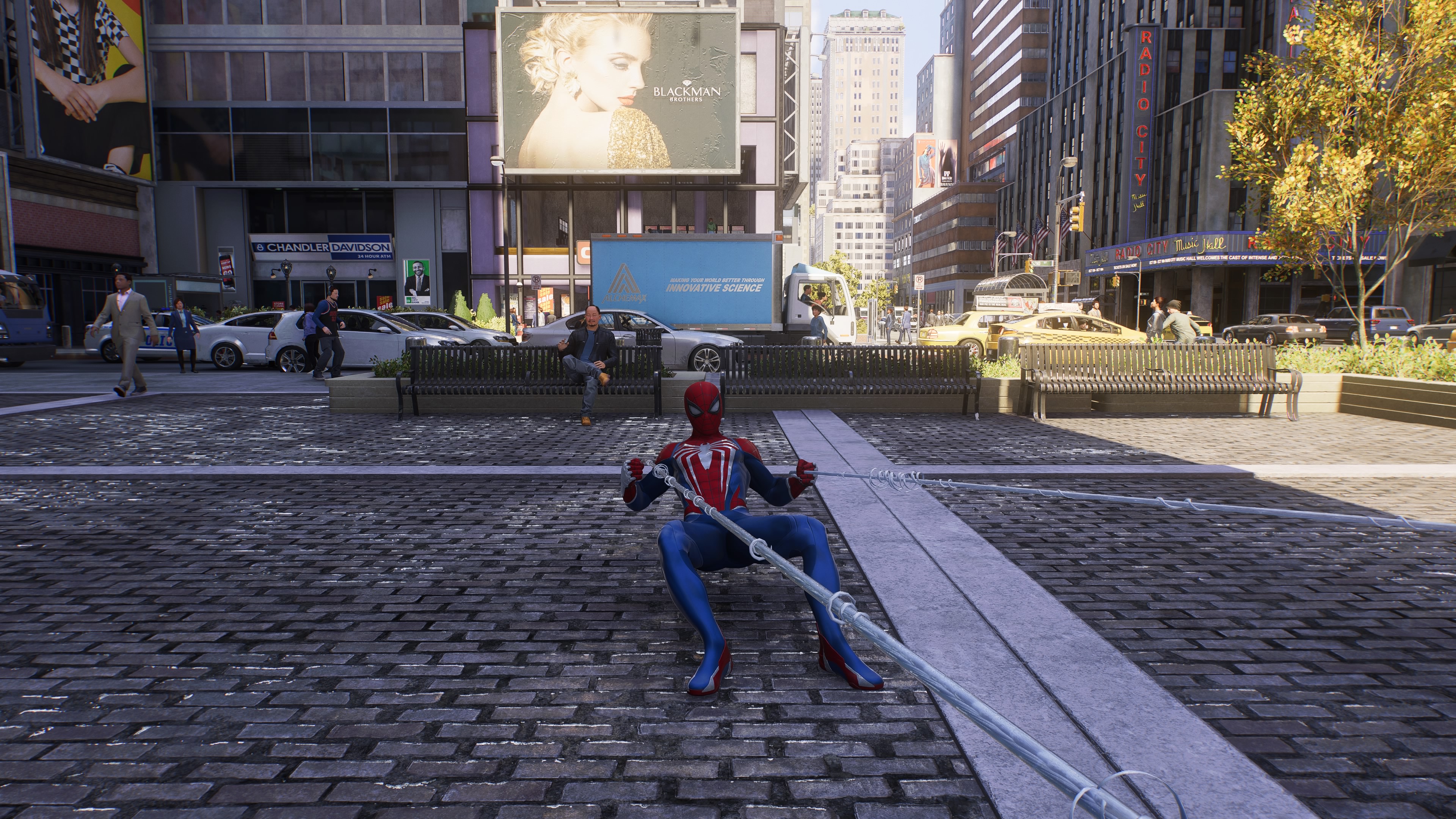 Spider-Man pulls back on a web slingshot in Spider-Man 2