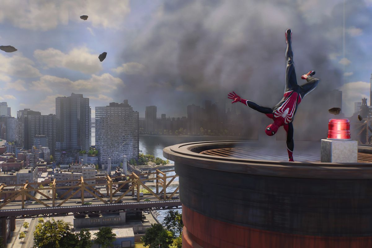 Spider-Man does a handstand on a powerplant in Spider Man 2 on PS5 while getting the Soar trophy.