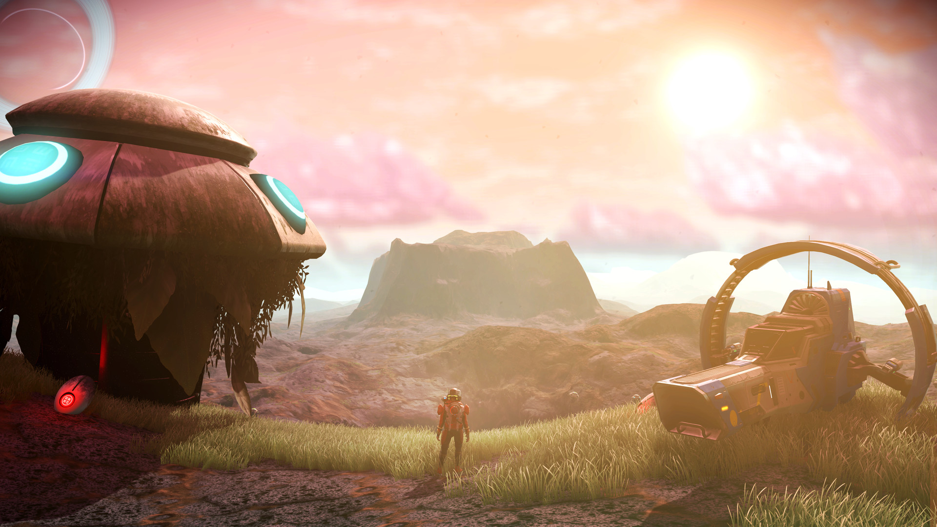 An explorer in No Man’s Sky stands looking out at the views of a sweeping, mountainous planet, with spaceship parts on either side