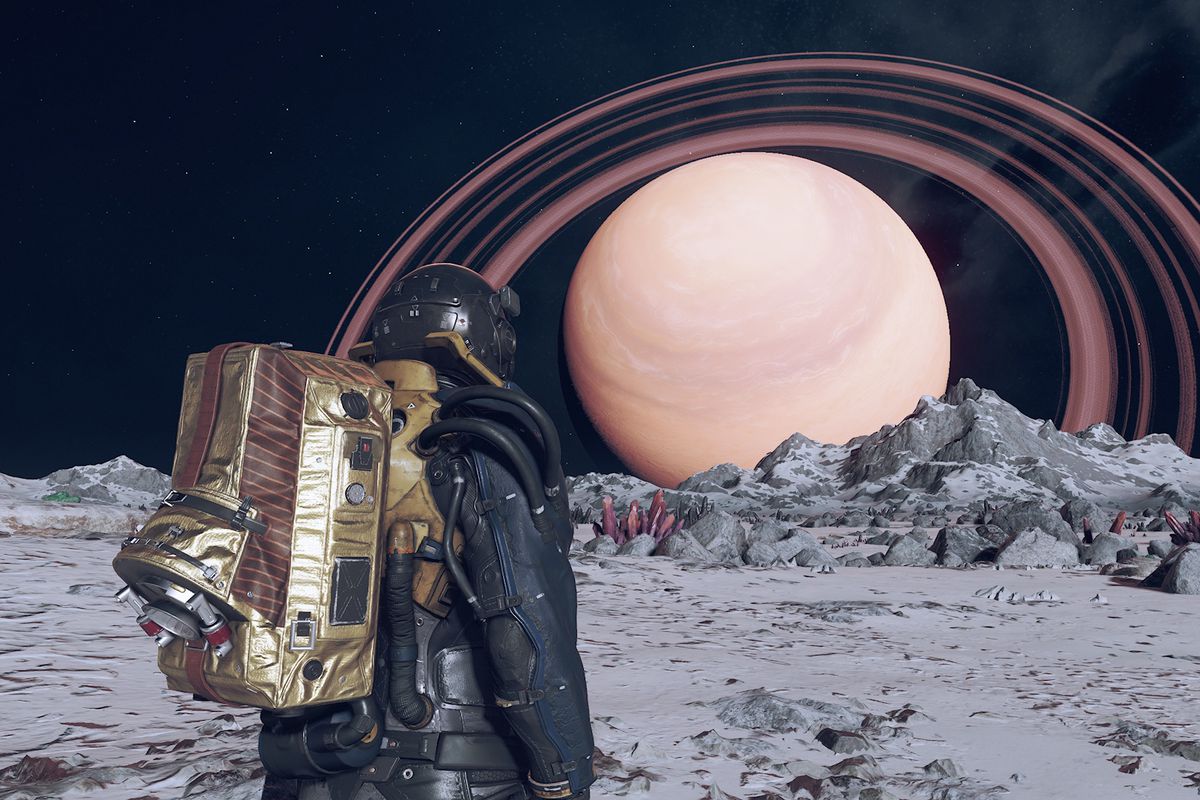 An explorer stares at a gas giant while standing on a lunar satellite in Starfield, the 2023 game of the year.